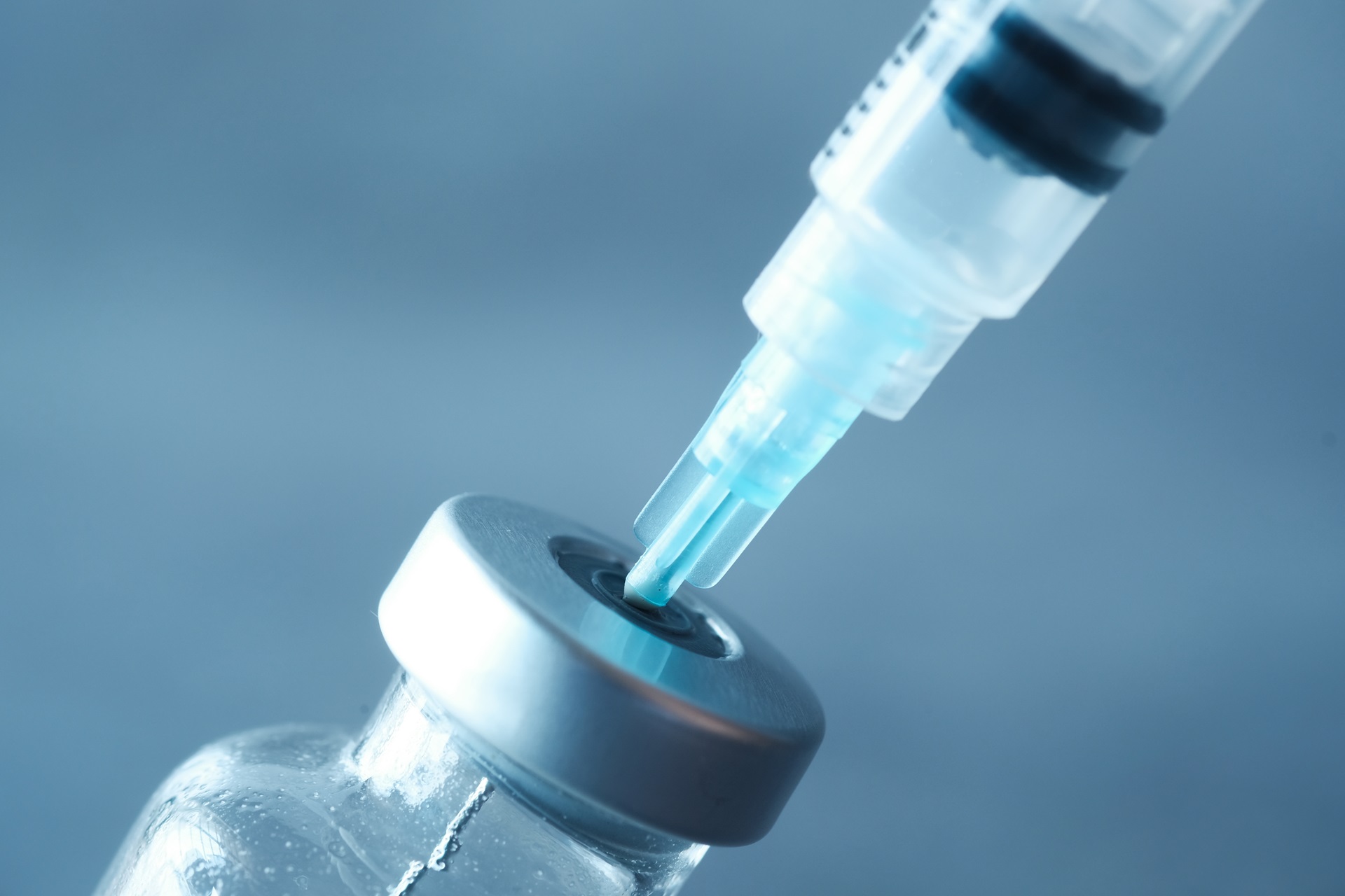 glass vial and syringe on black background 2023 11 27 05 31 48 utc