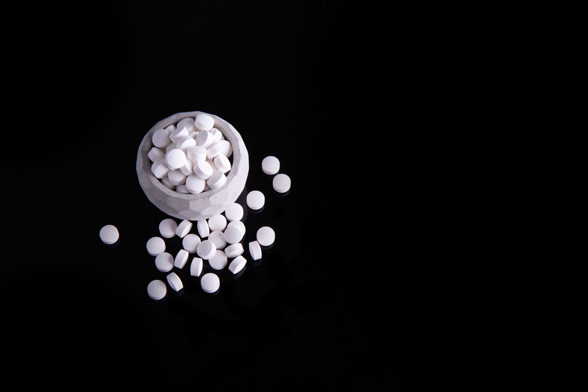 high angle shot of white round medicines in the cu 2023 11 27 05 08 42 utc