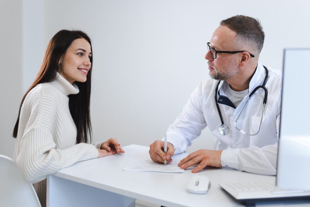 male doctor writes a treatment plan for the female 2023 11 27 04 52 16 utc